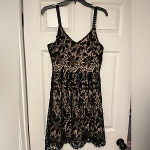 Black lace dress made by She-Sky. Size Large NWT